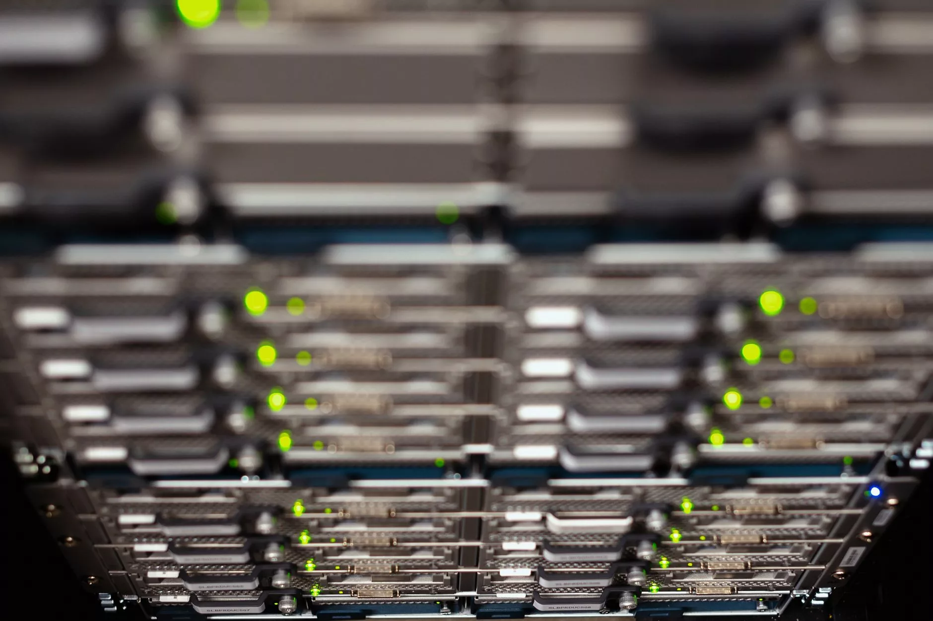 Mitigating Advanced Vulnerabilities: RCE, SSRF, and File Upload Risks server rack illuminated with secure green status indicator lights
