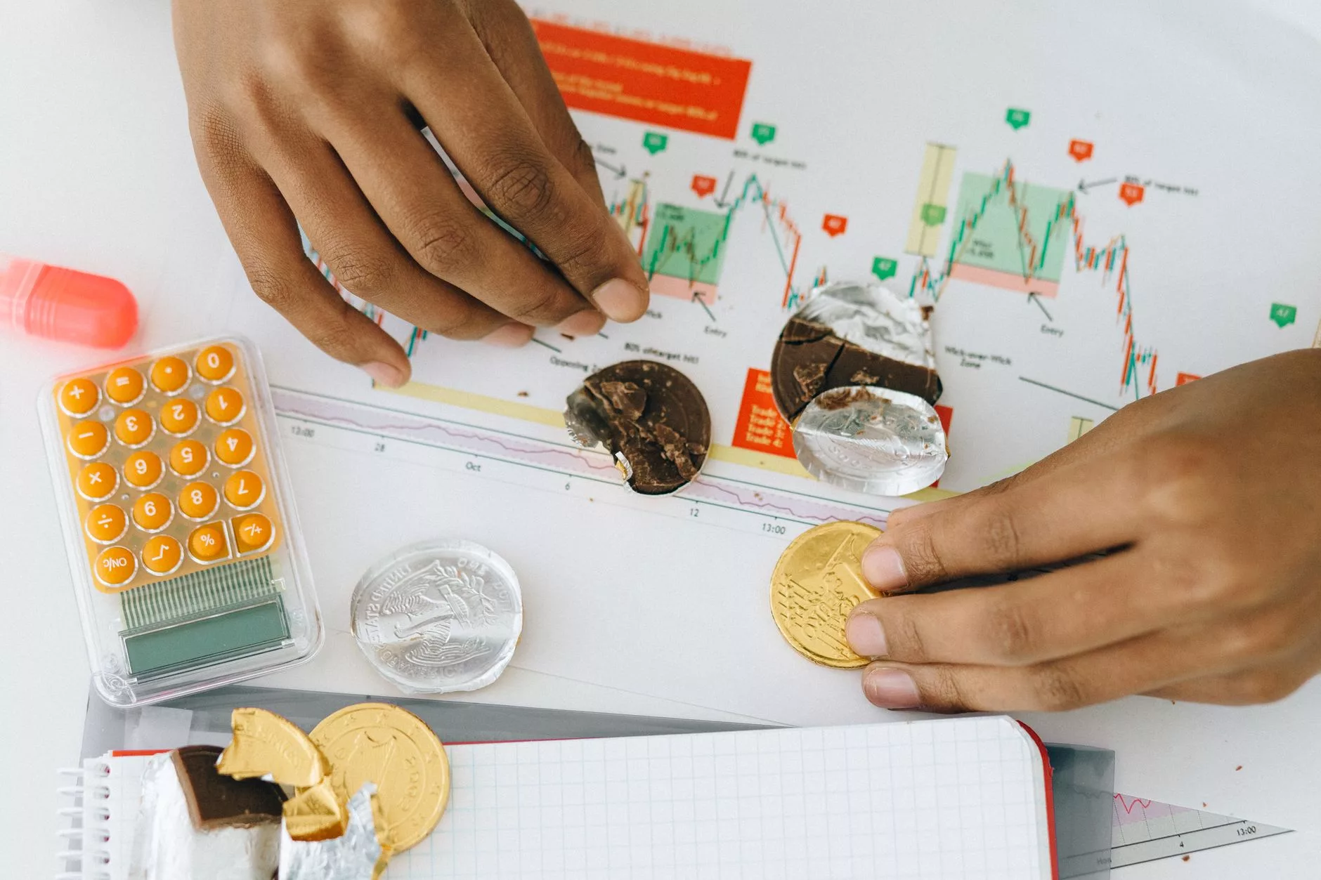 Total Cost of Ownership: Pricing Structures and Hidden Fees financial planning calculator resting on top of digital budget charts and reports