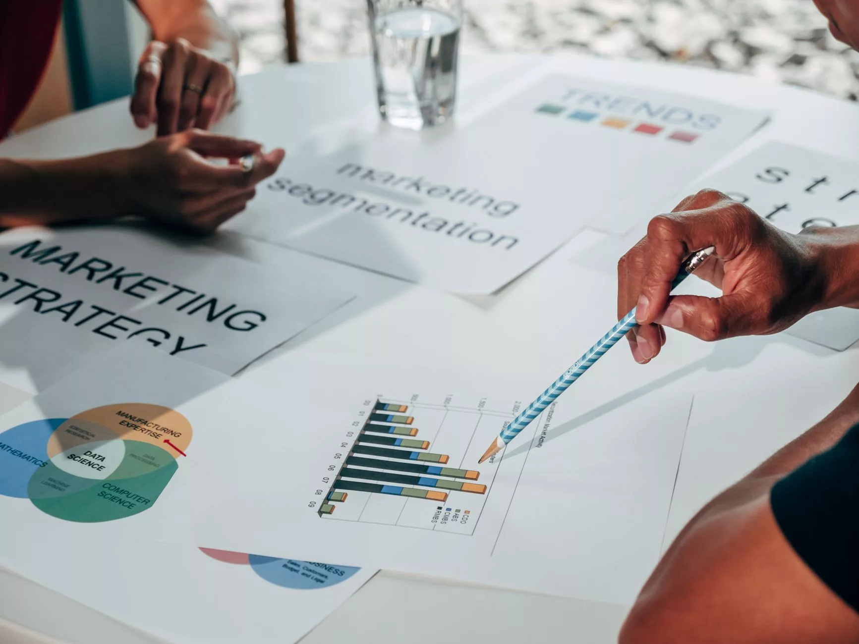 B2B Non-Branded Search Ads and Scaling Pressures marketing team reviewing b2b search performance metrics on screen