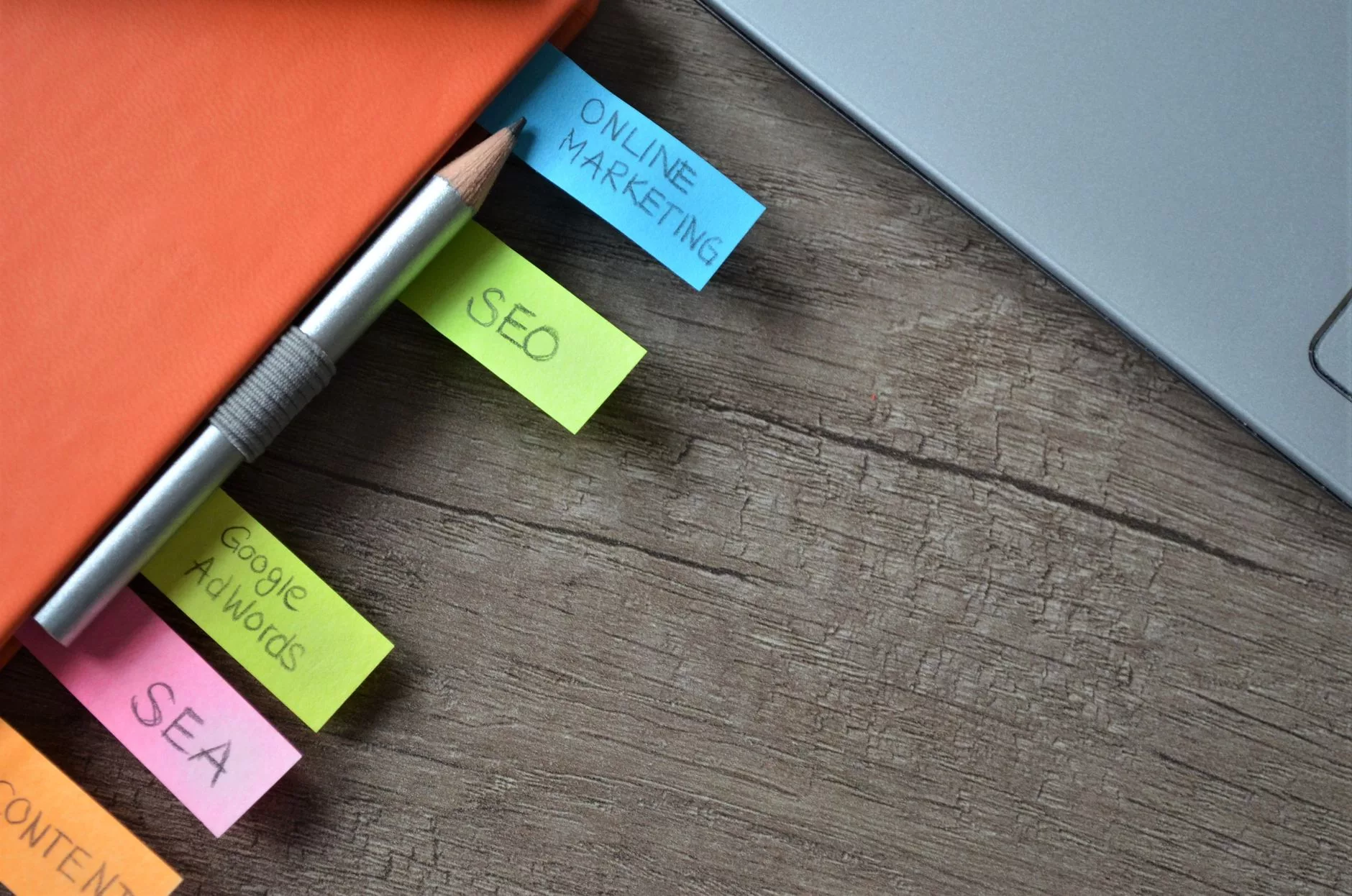 Practical Strategies to Lower Your CPC and Improve ROI marketing specialist working on laptop to optimize search ad campaigns
