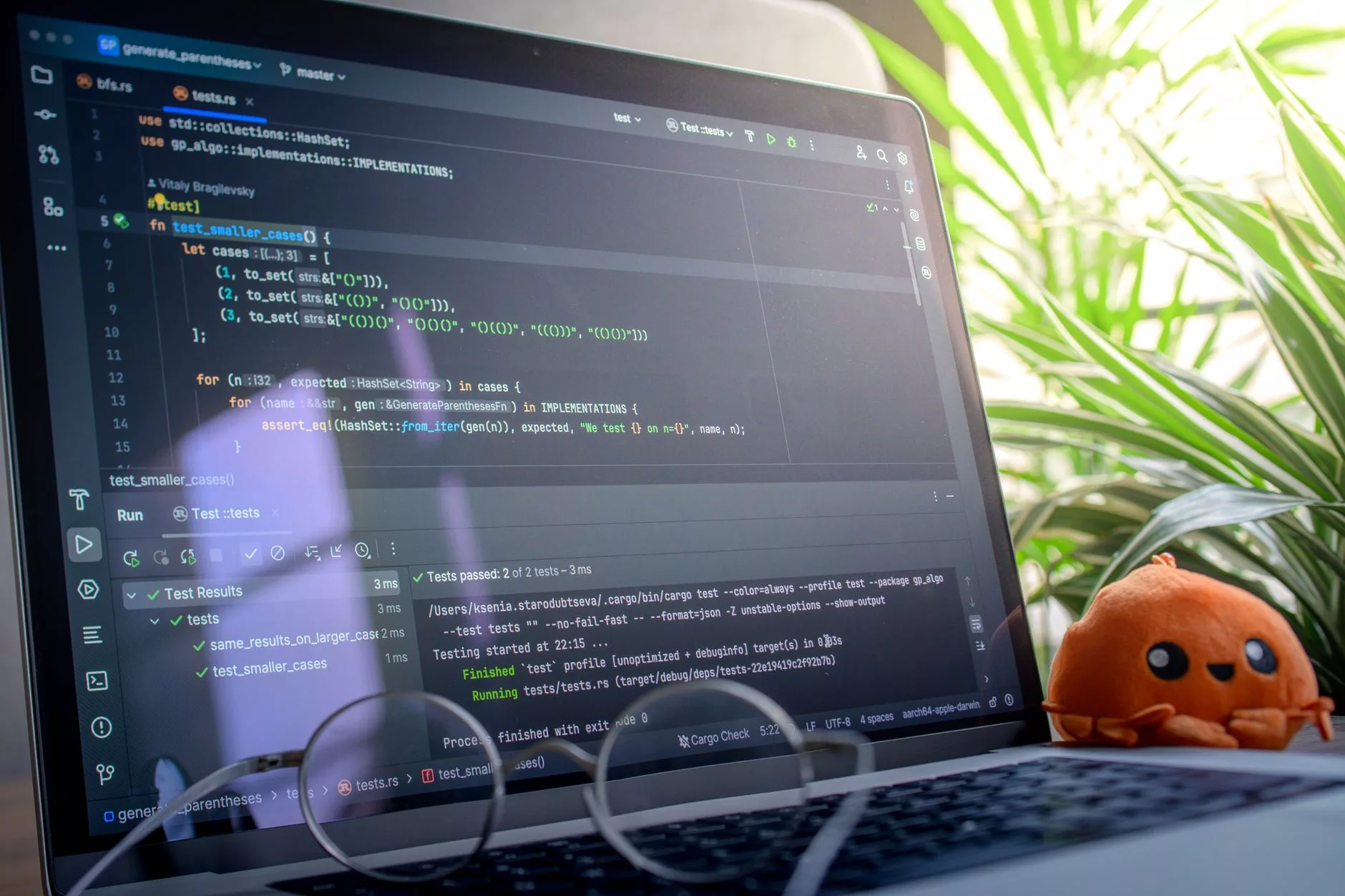 web developer reviewing staging server logs on dual monitors