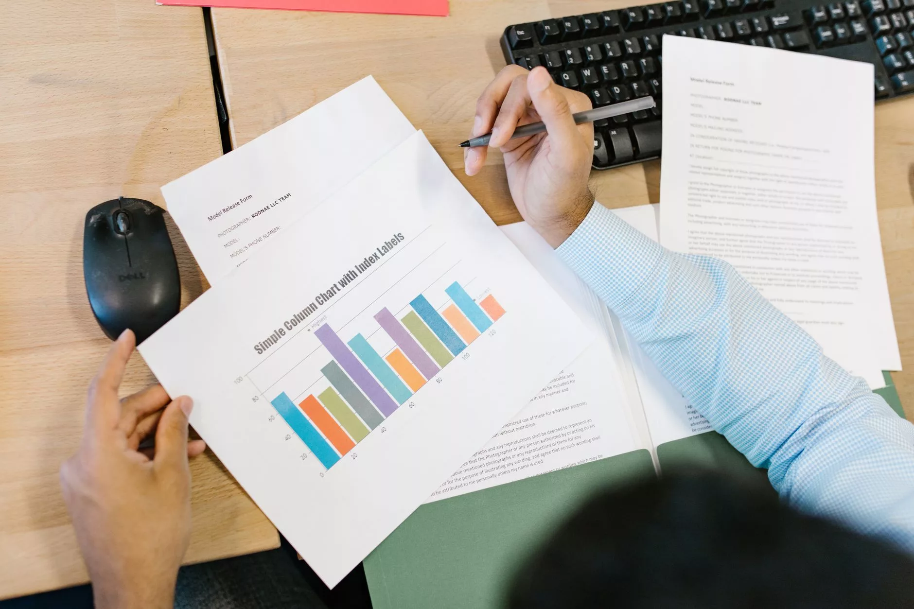 The Illusion of the Hour-of-Day Report and Manual Bidding marketing specialist looking at analytical data charts on a laptop screen
