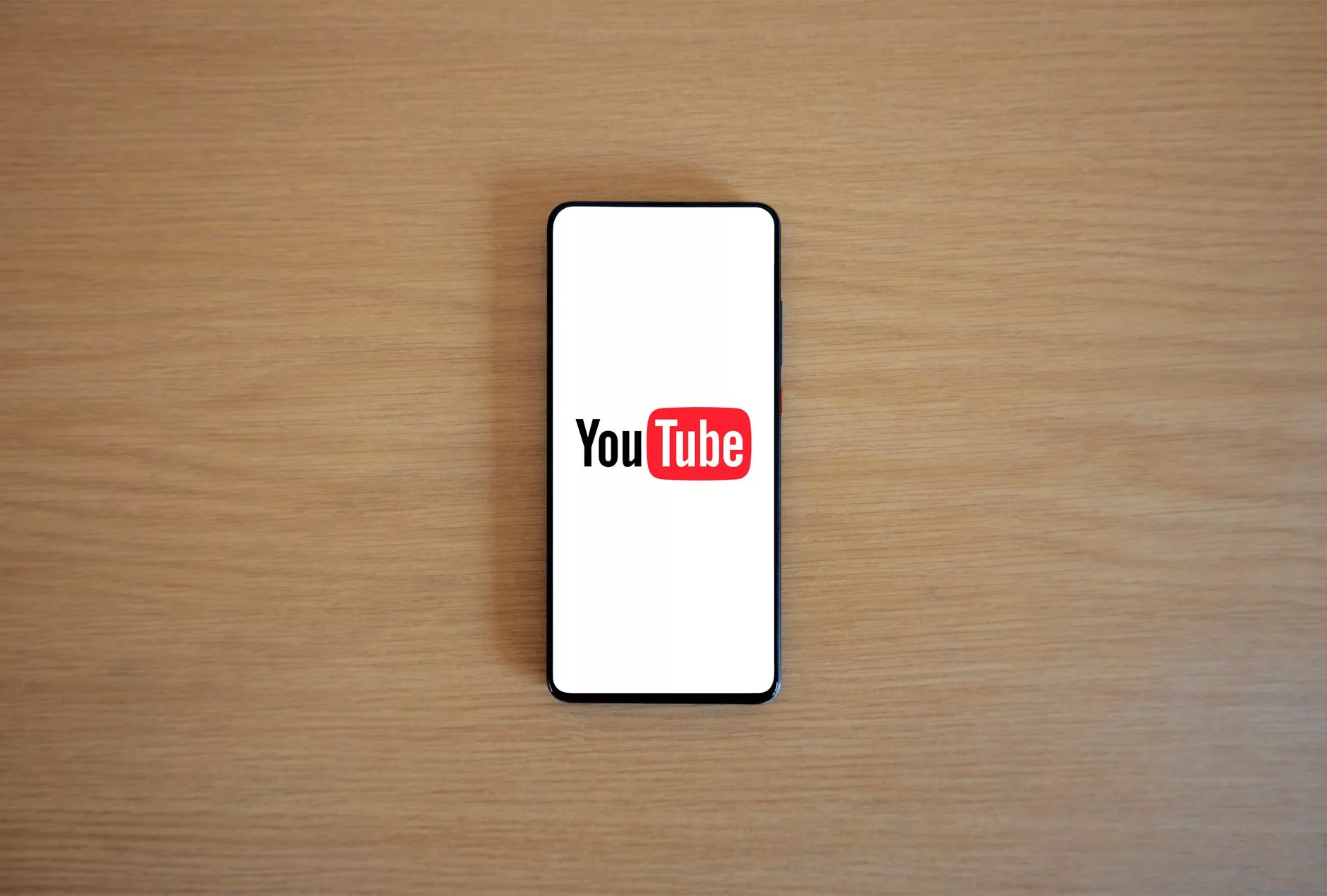 YouTube Updates Personalized Advertising Policy for Alcohol Brands mobile phone showing a video platform app screen